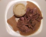 A picture of step 3 of Pork hock with in season asparagus sauce.