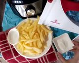 A picture of step 3 of Masala fries.