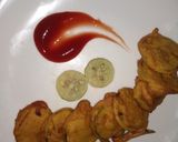 A picture of step 3 of Baingan Bhaja.