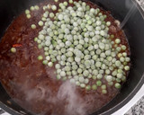 Foto del paso 5 de la receta: Guisantes picantitos con morcilla y menta y huevo poché