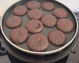 A picture of step 11 of Healthy Atta Jaggery Muffins in Appe Pan.