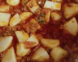 A picture of step 5 of Masala Aloo Bengun 🧡💛.