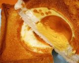 A picture of step 1 of Egg in hole, done in airfryer.