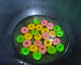 Foto langkah ke 6 dari resep Donat mini glasir gula.