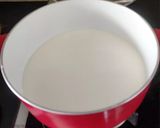 A picture of step 3 of Mango popsicles.