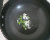 A picture of step 2 of Veg Chinese Masala Noodles.