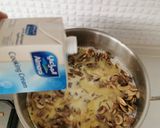 A picture of step 3 of Creamy Mushroom soup, drizzle truffle oil, rustic croutons.