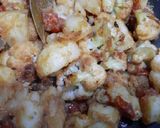 A picture of step 9 of Phulkopi,aloo diye Chhanar Dalna.