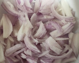 A picture of step 1 of Kanda Bhajiya.