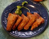 A picture of step 5 of Singhara atta triangles.