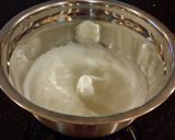 A picture of step 9 of Patriotic Vanilla Cake Roll with Whipped White Chocolate Ganache Filling and Frosting.