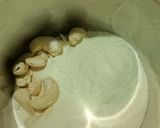 A picture of step 1 of Nolen Gurer Chitai Dudh Pithe.