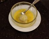 A picture of step 6 of Toasted Coconut Thumbprint Cookies.
