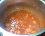 A picture of step 9 of One-pot Vatha kuzhambu rice.