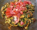A picture of step 6 of Achaari Karela.