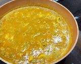 Foto del paso 4 de la receta: Arroz meloso con calamares, mero y guisantes