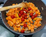 A picture of step 9 of Sweet Potato with Green Bell Pepper and Tomatoes in Fruity Sauce.