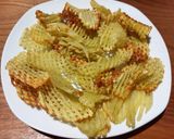 Foto del paso 3 de la receta: Papas rejilla en airfryer