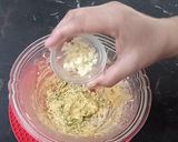 A picture of step 2 of Cheesey Garlic Bread/Bun.