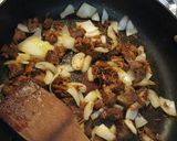 A picture of step 7 of Birria Revolcada.