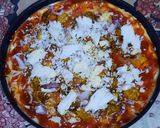 A picture of step 7 of Chicken tikka pizza.