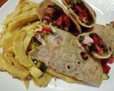 A picture of step 2 of Chicken wrap sandwich with potato wedges.