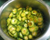 A picture of step 1 of Karela potato ki sabji.