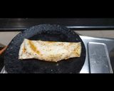 A picture of step 12 of Schezwan Cheese Dosa.