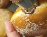 A picture of step 13 of Mardi Gras Chocolate Donuts.