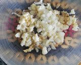 Foto del paso 5 de la receta: Tomate relleno de ensalada de arroz y bacalao
