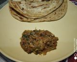 A picture of step 4 of Laccha parantha with bharta.