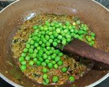 A picture of step 14 of Palak Methi Matar.