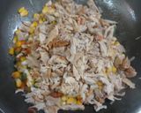 A picture of step 2 of Chicken cheese white sauce farfalle pasta.