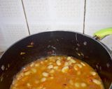 A picture of step 7 of Spiced White runners beans in grated carrots.