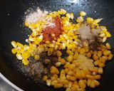 A picture of step 4 of Mall PVR style spicy corn black salt butter masala.