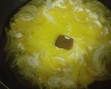 Foto del paso 2 de la receta Arroz salteado con tomates rosas y mejillones en salsa