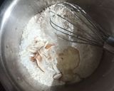 A picture of step 1 of Eggless almond pan cake with wheat flour.