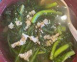 A picture of step 1 of Chrysanthemum Greens Soup and Stir-Fried Bok Choy with Mushrooms.