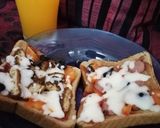 A picture of step 2 of Bread pizza.