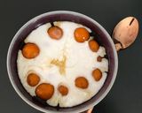 A picture of step 7 of Kolak Biji Salak - Sweet potato balls in palm sugar syrup and coconut milk.