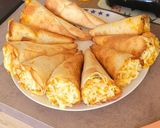 صورة لخطوة 2 من وصفة اقماع التورتيلا بحشوة الدجاج والجبن 🧀