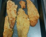 Foto del paso 7 de la receta: Merluza apanada al horno