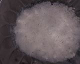 A picture of step 1 of Coconut laddu.