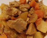 A picture of step 9 of Coconut Chicken Curry.