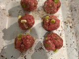 Sticky hoisin beef meatballs with sesame veg