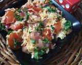 A picture of step 4 of Onion tomato fried rice.