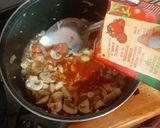 A picture of step 2 of Chicken in Tomato and Mushroom Sauce.