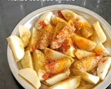 A picture of step 1 of Masala potato garnish with onion flower stalk.