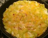 A picture of step 4 of Zucchini with Ham, Cheese, and Eggs.