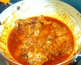 A picture of step 13 of Chicken Rogan Josh.